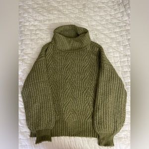 Chunky oversized cable knit turtleneck sweater